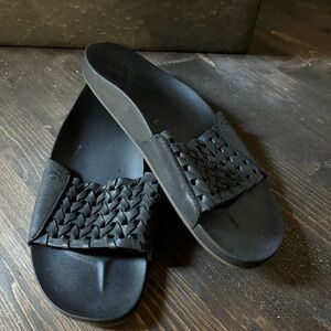 Olukai black woven slide sandals